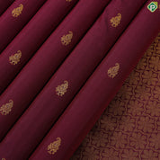 Maroon gold zari mango butta with beige with self stripes half and half trendy silk saree