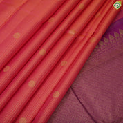 Pinkish orange gold zari vairaoosi checked mid round butta purple gold zari border traditional silk saree