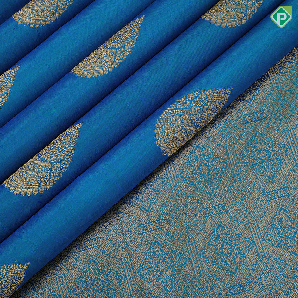 Peacock blue gold zari self designed thilagam butta self color gold zari edge border traditional silk saree