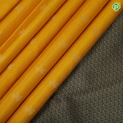 Mango yellow gold zari flying Kamdhenu butta olive green gold zari multi design line border traditional silk saree