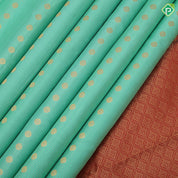 Pista green gold zari thousand butta design rani red gold zari floral border traditional silk saree