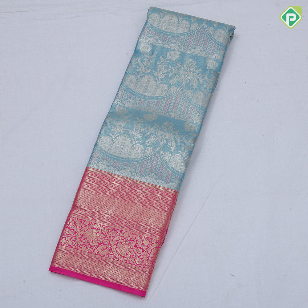 Pink silver zari fancy flower and arch design rama green gold zari rangoli border tissue art silk saree