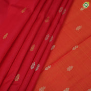 Tomato red gold zari fancy butta contrast mango yellow gold zari one side border silk saree