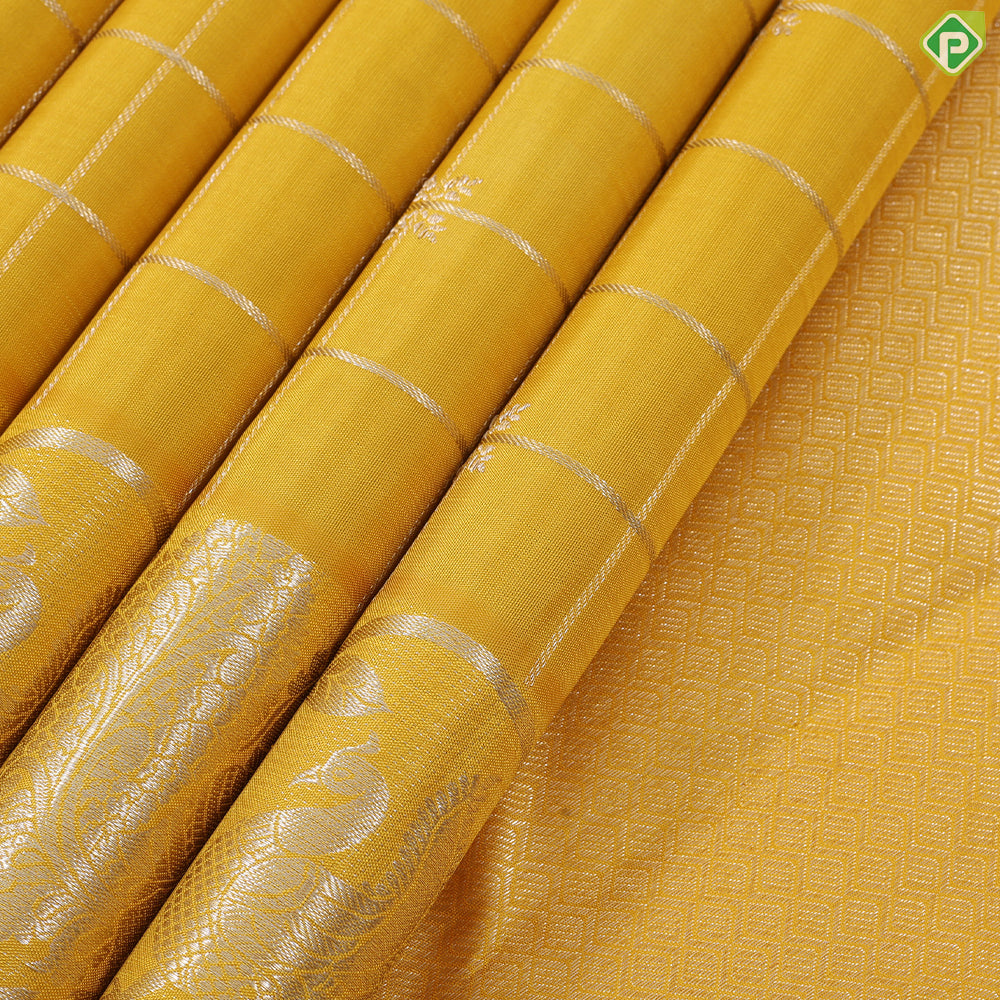 Cyber Yellow silver gold zari kattam (checkered) self peacock and creeper border Traditional silk saree