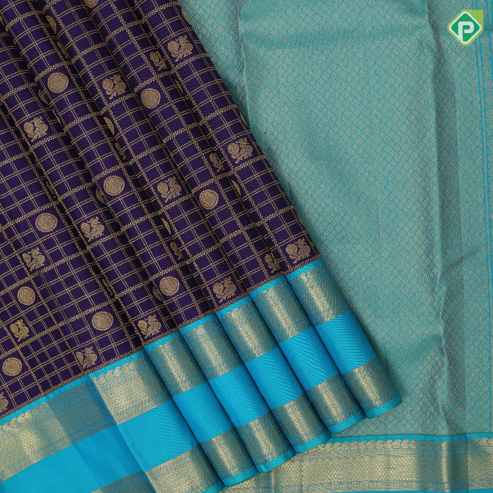 Dark blue gold zari peacock chakram butta checks design peacock green gold zari retta pattai border bridal silk saree