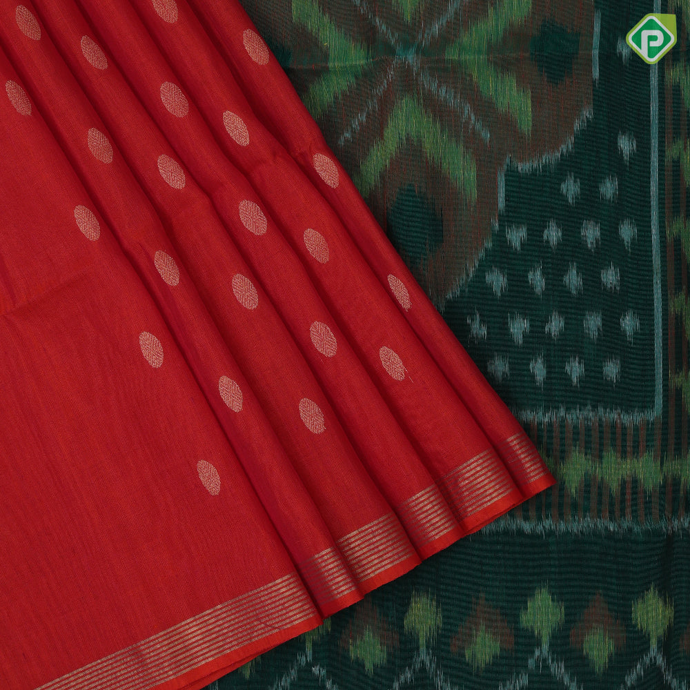 Tomato red gold zari chakkaram butta motifs self gold zari lines border bottle green ikkat style pallu linen soft silk saree