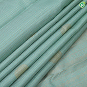 Manthulir green gold zari vairaoosi checks self gold zari multi design lines border traditional silk saree