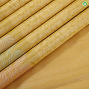 Mango yellow silver zari grand floral design self fancy leaf meena work border trendy tissue silk saree