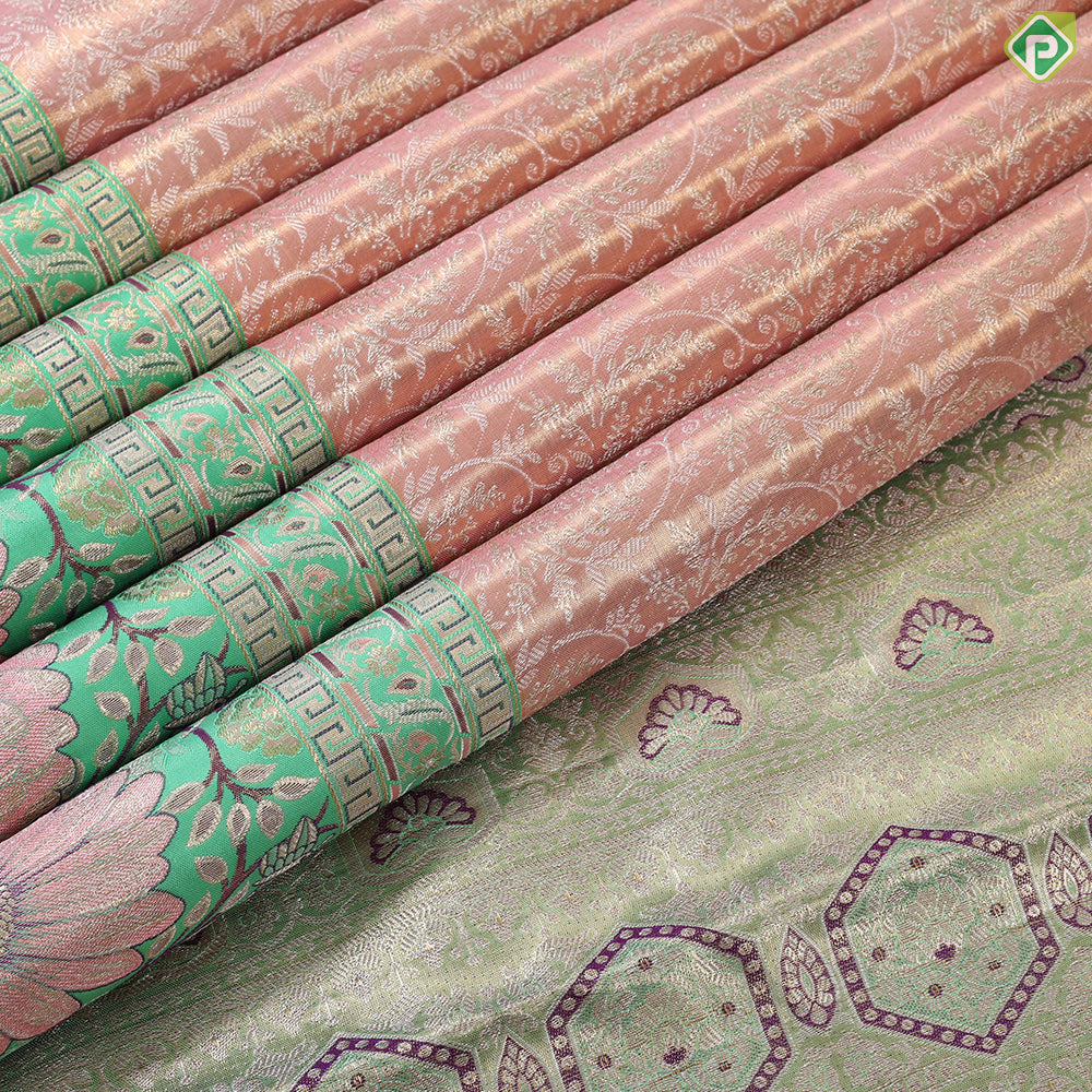 Goldish onion silver zari floral creeper design contrast parrot green border grand bridal tissue silk saree