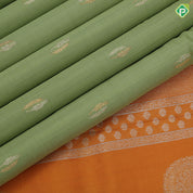 Cardamon green silver gold zari double cone butta mustard yellow silver gold zari rangoli border traditional silk saree