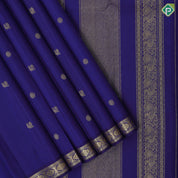 Indigo blue gold zari mayil chakkaram butta design self gold zari flower motif edge border traditional silk saree