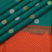 Emarald green silver gold zari round dots self gold zari border contrast orange pallu soft silk saree