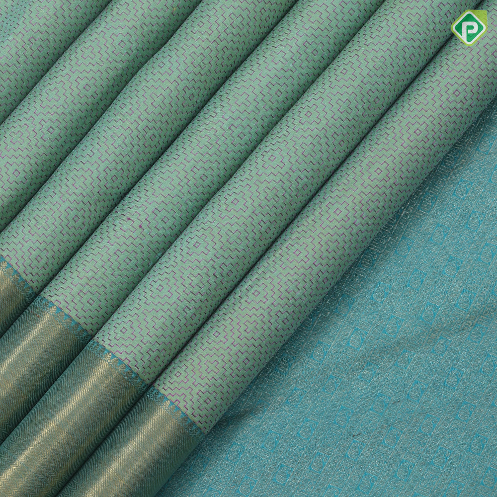 Pista green pink silk thread work embroidered design rexona green gold zari bavanji border traditional silk saree