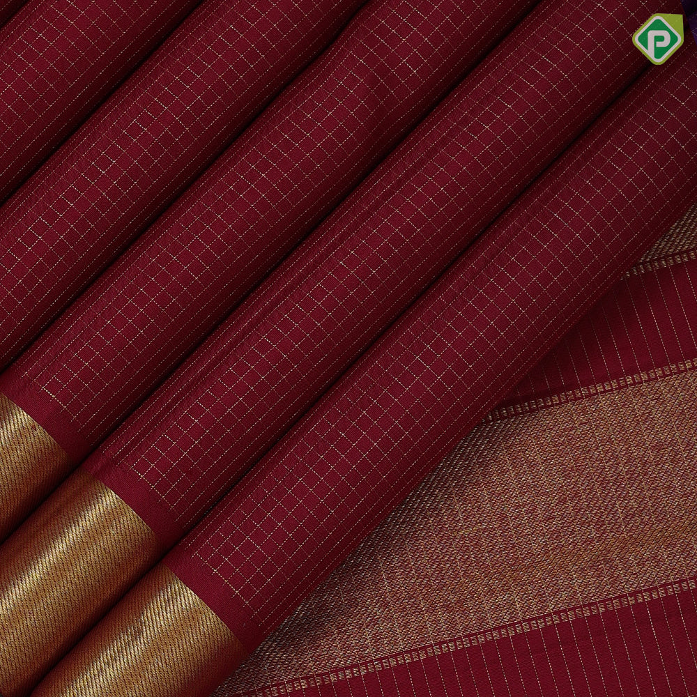 Maroon gold zari checks design self gold zari bavanji green edge border koorai pattu saree