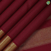 Maroon gold zari checks design self gold zari bavanji green edge border koorai pattu saree