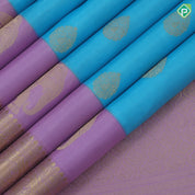 Sky blue gold zari Thilagam flower butta design lavender gold zari three line design border traditional silk saree
