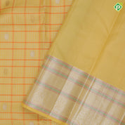 Lemon yellow silver zari checks gold zari butta self silver gold zari meena work border Navratri special silk saree