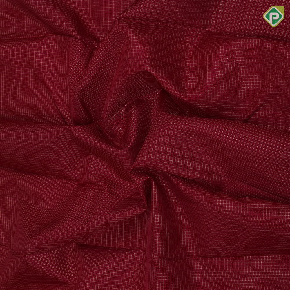 Maroon gold zari checks design self gold zari bavanji green edge border koorai pattu saree