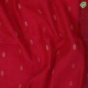 Tomato red gold zari chakkaram butta motifs self gold zari border contrast ikkat design pallu linen soft silk saree