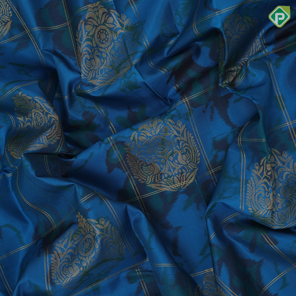 peacock blue self designed round butta and checks ikkat design borderless ikkat fusion silk saree