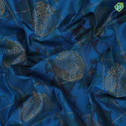 peacock blue self designed round butta and checks ikkat design borderless ikkat fusion silk saree
