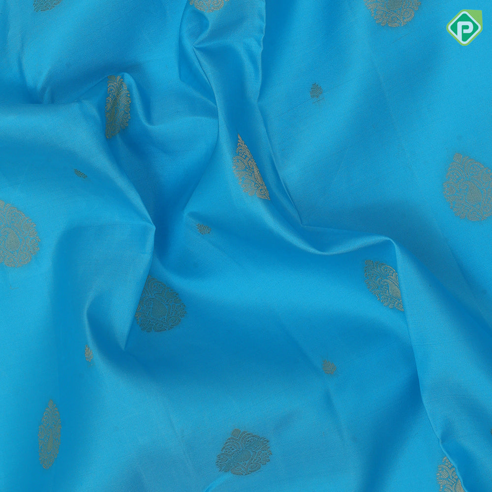 Sky blue gold zari Thilagam flower butta design lavender gold zari three line design border traditional silk saree
