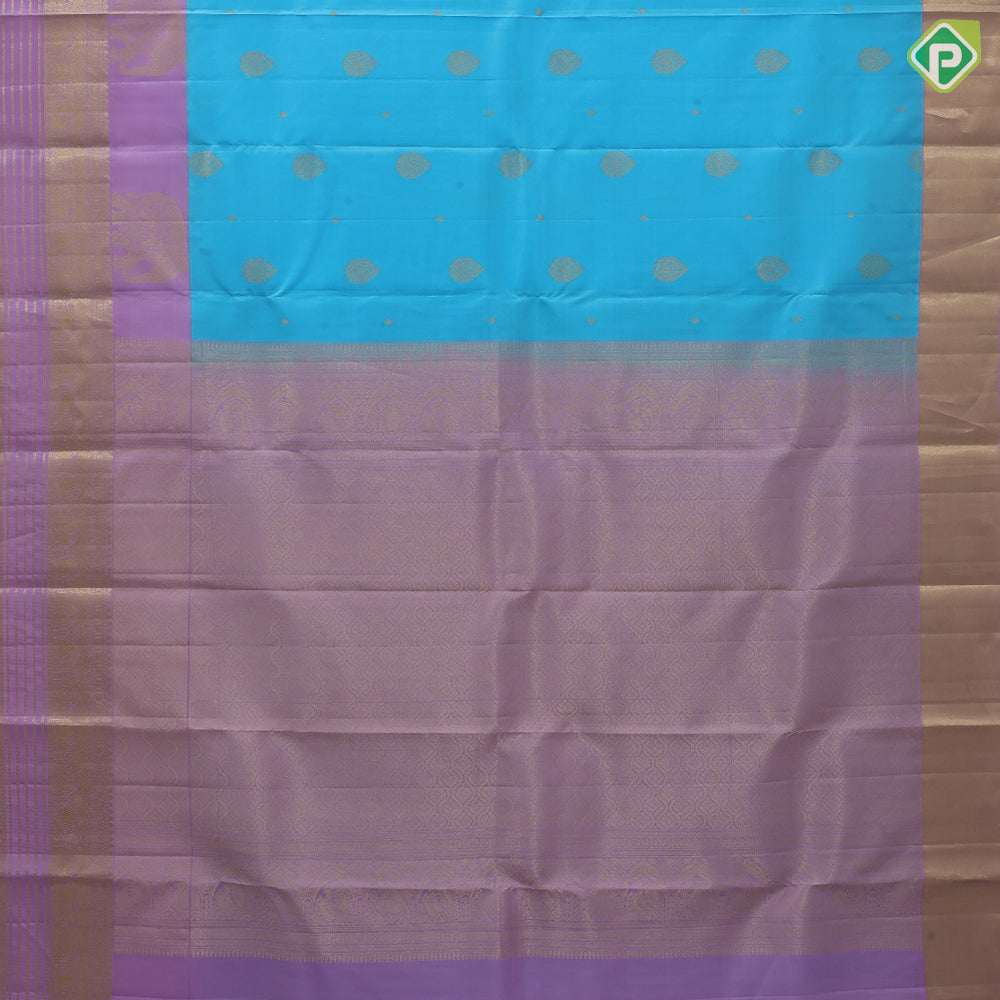 Sky blue gold zari Thilagam flower butta design lavender gold zari three line design border traditional silk saree