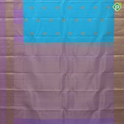 Sky blue gold zari Thilagam flower butta design lavender gold zari three line design border traditional silk saree