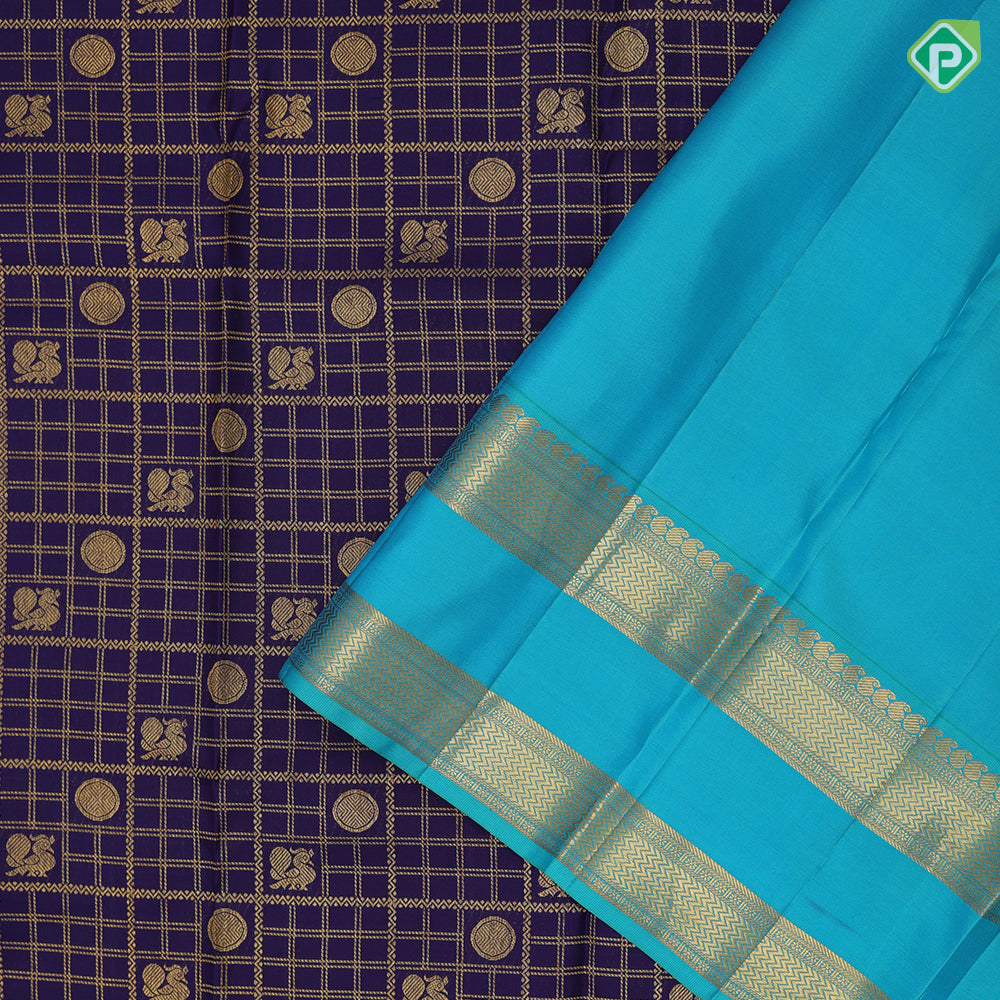 Dark blue gold zari peacock chakram butta checks design peacock green gold zari retta pattai border bridal silk saree