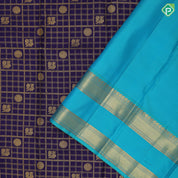 Dark blue gold zari peacock chakram butta checks design peacock green gold zari retta pattai border bridal silk saree