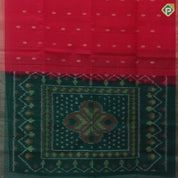 Tomato red gold zari chakkaram butta motifs self gold zari border contrast ikkat design pallu linen soft silk saree