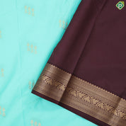 Spring green gold zari butta design contrast brown rangoli border gift saree