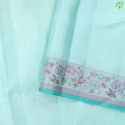 Suffire green silver zari zig zag waves design self multi color pythonic border grand bridal silk saree