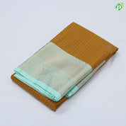 Mustard yellow gold zari stripes big thilagam butta pista green gold zari rangoli design border art silk saree