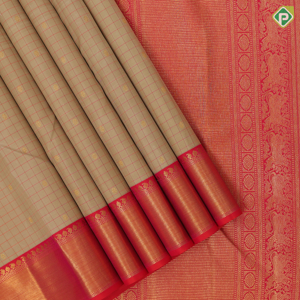 Butter biscuit with orange pattu kattam gold zari rudraksham butta rani pink gold zari cross lines border traditional silk saree