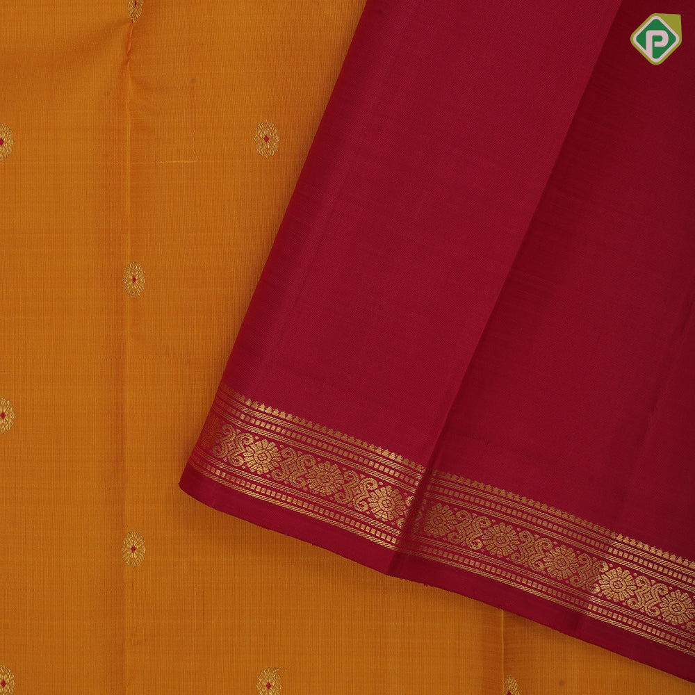 Mustard yellow chakaram design maroon flower border design traditional silk saree