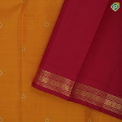 Mustard yellow chakaram design maroon flower border design traditional silk saree