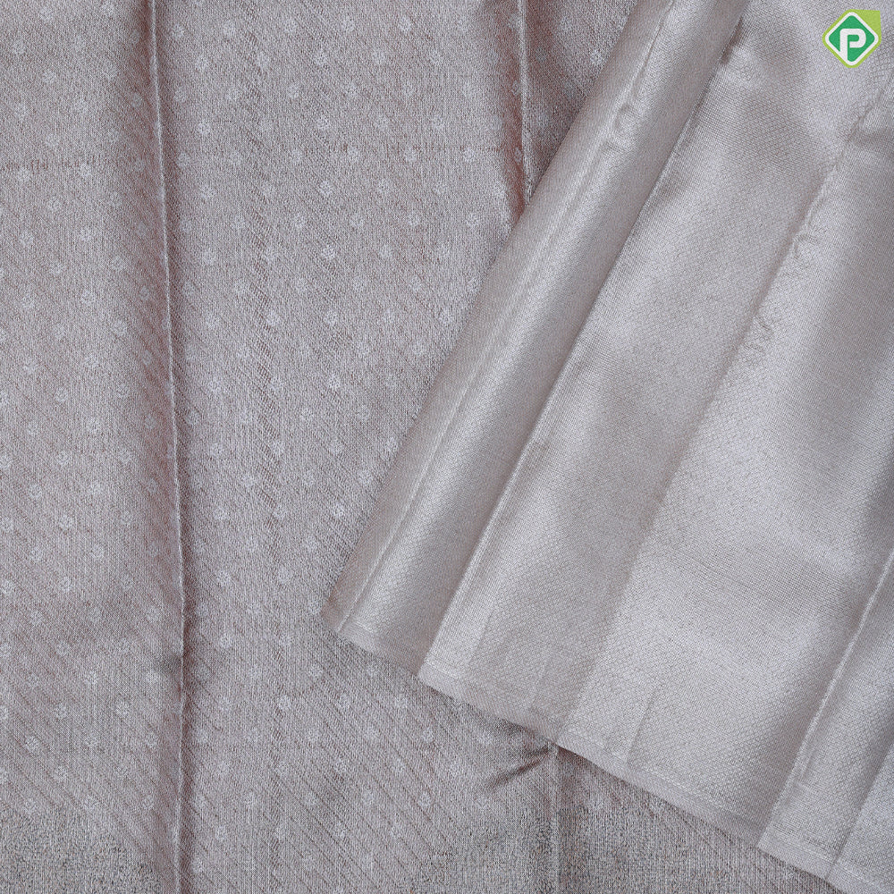 Dark peach silver zari zari by zari butta and shimmer design self cow and tree border master weaved pichwai silk saree