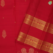 Tomato red gold zari thilagam and double gaja yaali butta self gold zari rettapattai border traditional silk saree