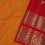 Mustard yellow silver gold zari small butta motifs paaalum pazhamum gold zari border traditional silk saree