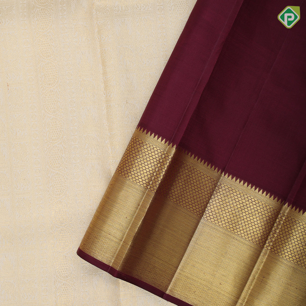 White gold zari hundred design buttas maroon gold zari partial bavanji border exclusive bridal silk saree