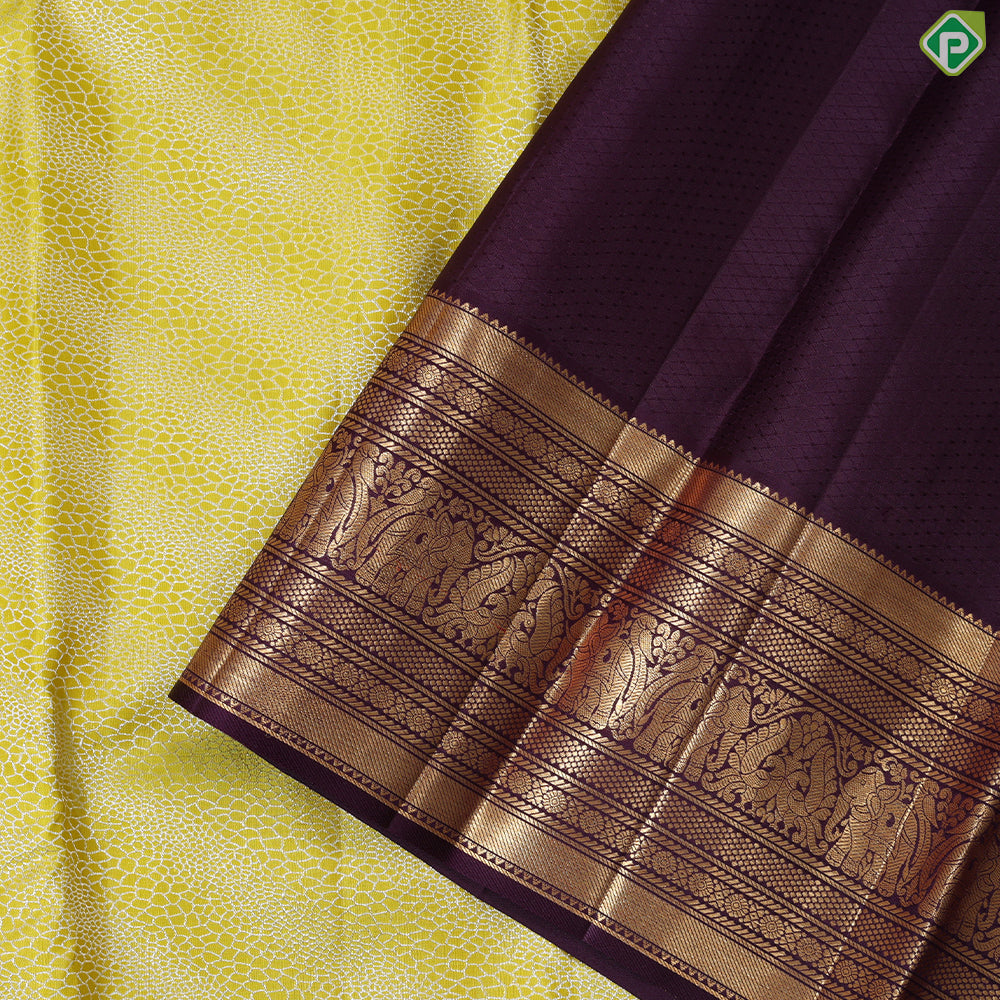 lemon yellow silver zari geometric design contrast purple gold zari border exclusive bridal silk saree