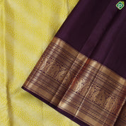 lemon yellow silver zari geometric design contrast purple gold zari border exclusive bridal silk saree