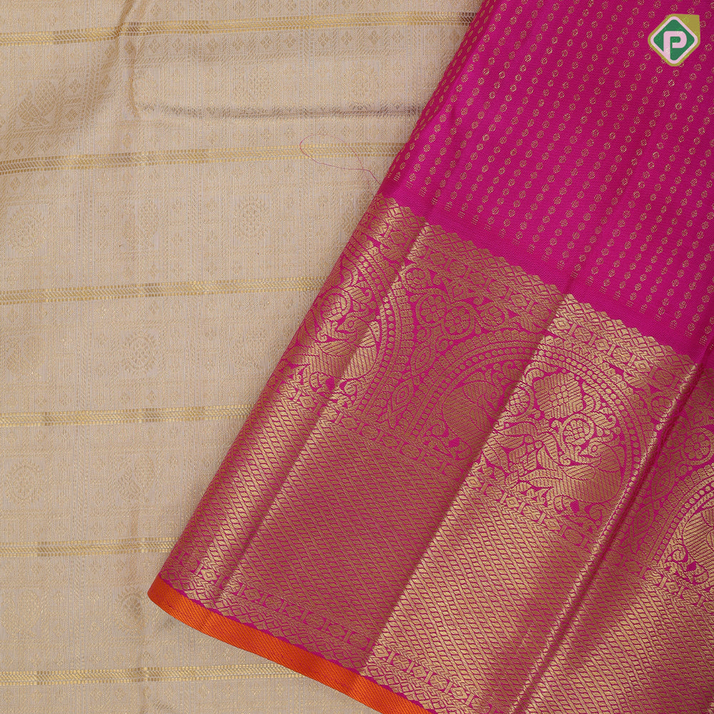 creamy sandal gold zari grand buttas filled checks contrast pink gold zari double peacock arch design border grand bridal silk saree