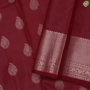 Beetroot maroon vairaoosi thilagam butta self copper zari mayilkan border traditional silk saree