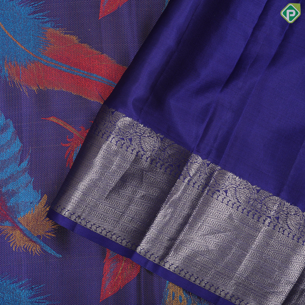 Indigo blue multi color feather design self color silver zari rangoli zig zag border trendy silk saree