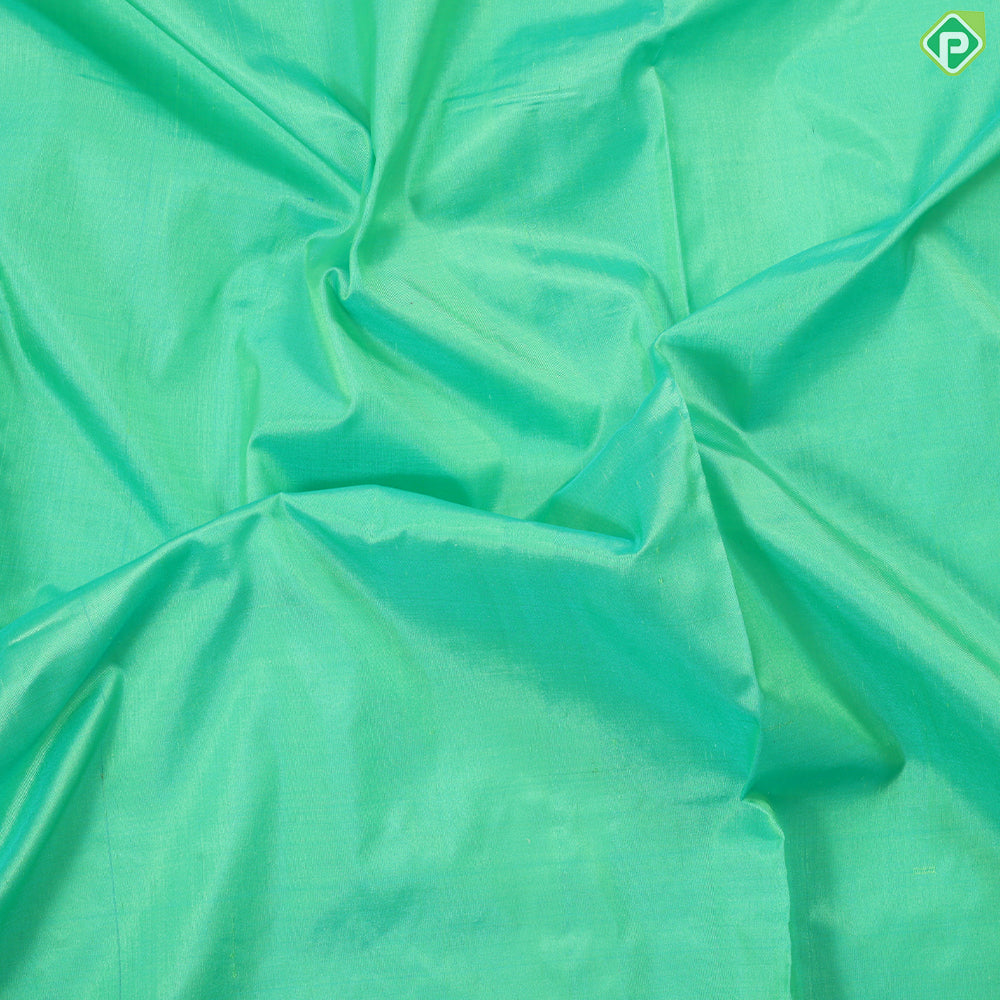 Rexona green plain weaved design self color gold zari edge border madisar 9 yards silk saree