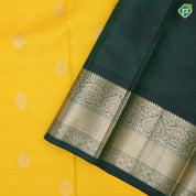 Lemon Yellow Thilgam  Butta Design Bottle Green Floral Border Design Traditional Silk Saree