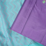 Sea blue lavender zig zag embossed design self meena work big butta border trendy silk saree