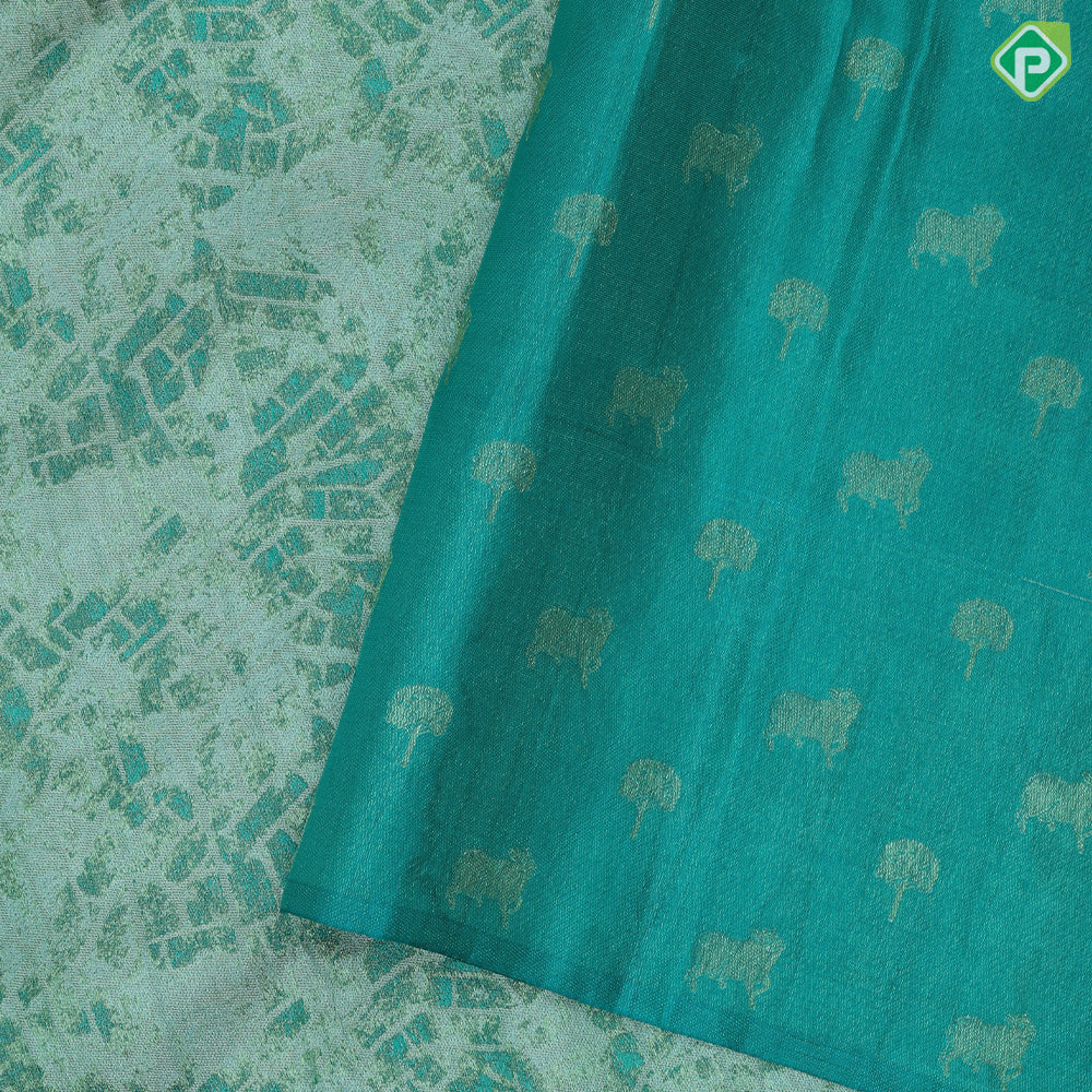 Multi green shade self modern art weaved design jungle green cow under tree design border pichwai silk saree